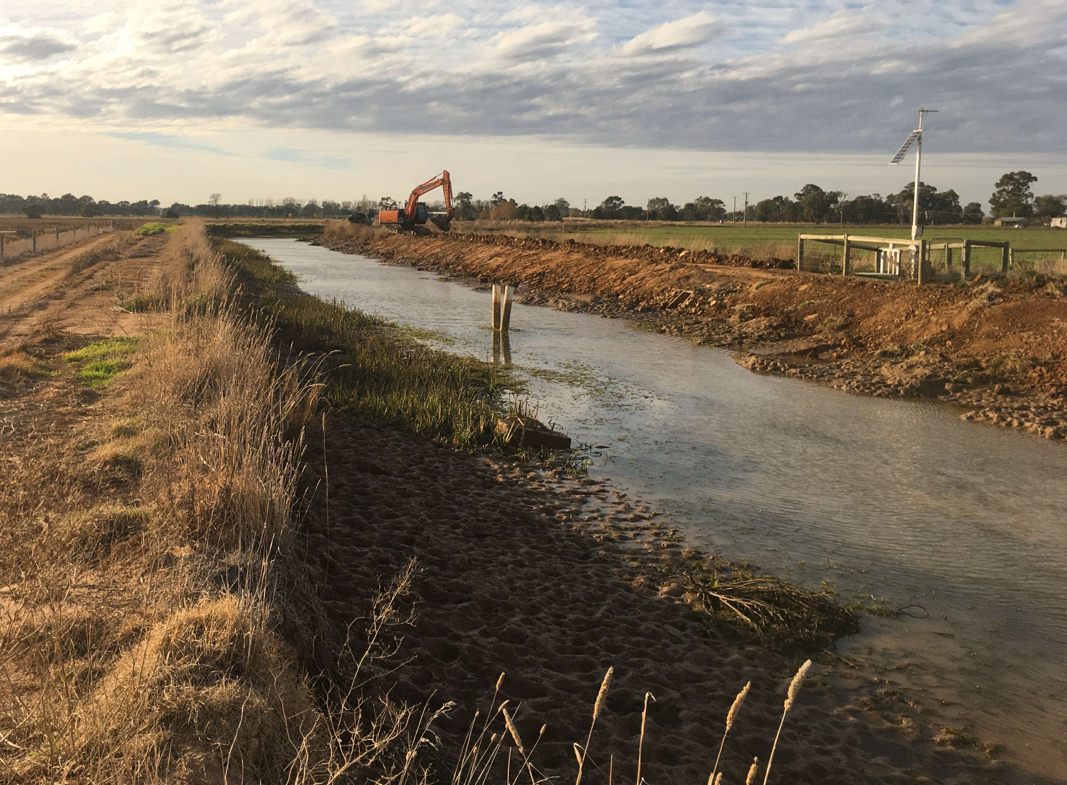 Photograph of machinery undertaking works on a channel