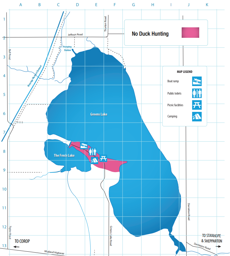 Map depicting Greens Lake and The Fresh Lake, highlighting a 'No Duck Hunting' area in pink near the southern shore. The map also marks areas with amenities such as boat ramps, public toilets, picnic facilities, and camping sites, primarily located in the southern part of Greens Lake. Key roads like the Midland Highway and Greens Lake Road provide access to the area. The map includes nearby locations such as Corop to the south and Stanhope & Shepparton to the southeast."